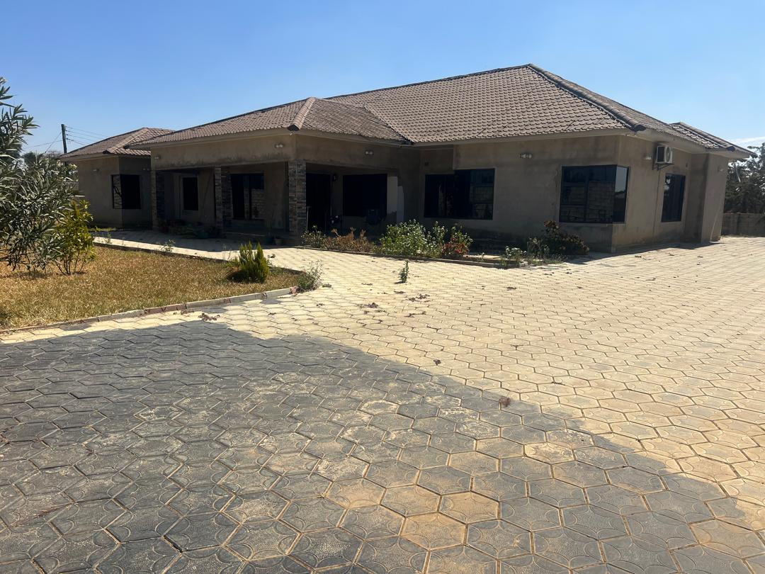 Four bedroom stand alone house for sale in Lusaka West with paved yard